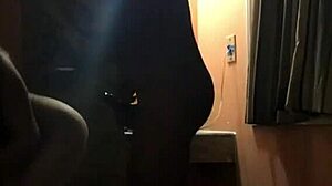 brunette in hotel with black man