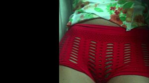 beautiful curly housewife teasing in shorts exhibitionist style