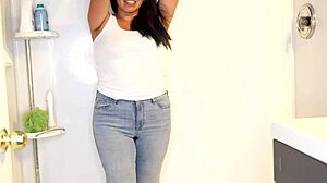 Latina woman wets her pants and panties, then strips and takes a shower