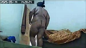 Hidden Camera Catches Maid Cleaning Naked with Huge Assets.