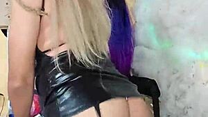 Transsexual dances seductively in crossdressing outfit