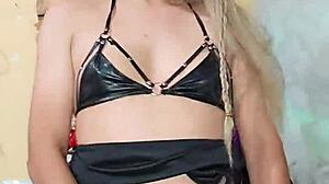 Transsexual dances seductively in crossdressing outfit