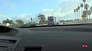 Brunette Drives Barefoot In Outdoor Car