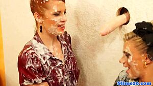 Hey, these cum-drenched babes just can't get enough of gloryholes, wanna watch?