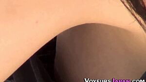 An Asian teen 18+ is filmed outdoors in high definition