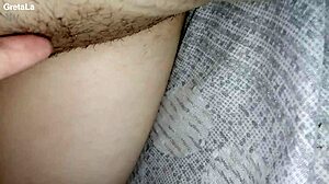 Gretala flashes her bushy pussy in amateur setting