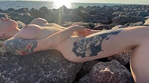 Hot Exhibitionist Masturbates on Public Beach