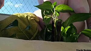 Why go naked watering plants on the balcony when anyone could spot your big natural tits?