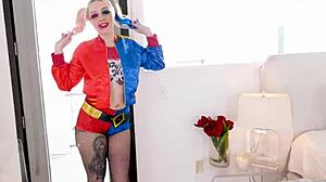 Arielle Aquinas, dressed as Harley Quinn, gives a blowjob to a huge cock and swallows the cum.