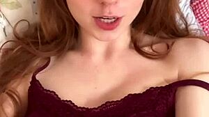 Busty british redhead fingers her pussy while talking dirty