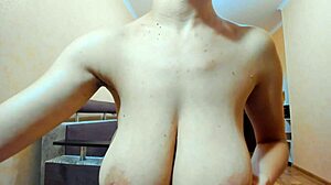 Bound in rope, she shows tits, pussy, and booty, pressing, sucking, and pulling nipples