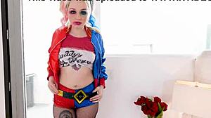 Arielle Aquinas, dressed as Harley Quinn, gives a blowjob to a huge cock and swallows the cum.