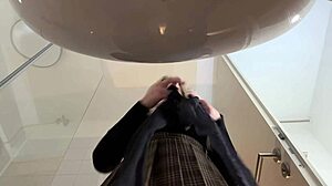 Hot blonde with big tits and ass strips in pantyhose and miniskirt in bathroom