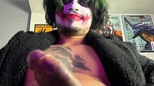Joker In Bat Costume Gives Huge Handjob And Masturbates Solo