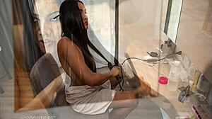 sindy models her orange swimsuit