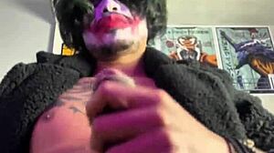 Joker In Bat Costume Gives Huge Handjob And Masturbates Solo