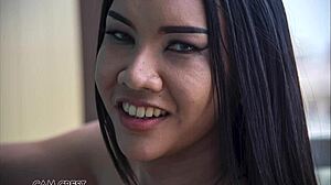 sindy models her orange swimsuit