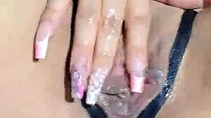 la coneja caliente masturbates her pink wet pussy to intense colombian fingering climax