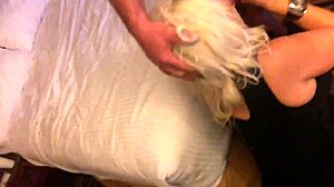 Hot blonde enjoys sucking on a pierced lollipop