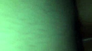 Man fucks his wife passionately in the bedroom, exploring her pussy deeply.