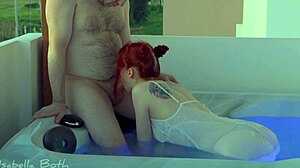 Redhead Couple Kissing And Sucking In Hot Tub