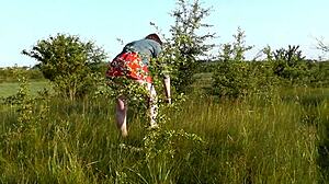 Beautiful brunette girl in short dress at wild beach