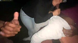 What a wild slut sucking two dicks in the parking lot!