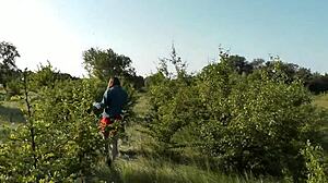 Beautiful brunette girl in short dress at wild beach