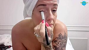 Topless Babe with Big Tits Prepares Makeup in Homemade Scene
