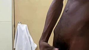 busting a huge cumshot in public toilet with big black cock