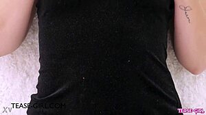 dazzling blonde model offers a subtle tease during her photoshoot session on the sofa