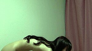 Naked slender japanese gets clothes off on webcam