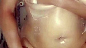 Beautiful amateur solos softly in bathroom