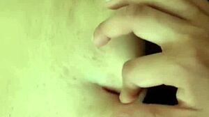 Amateur milf explores orgasmic belly fetish.