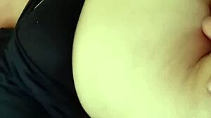 Amateur milf explores orgasmic belly fetish.