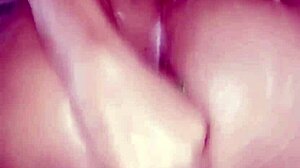 Beautiful amateur solos softly in bathroom