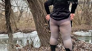 mother-in-law in white pantyhoses and big panties pees outdoors