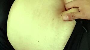 Amateur milf explores orgasmic belly fetish.