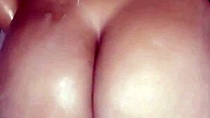 Beautiful amateur solos softly in bathroom