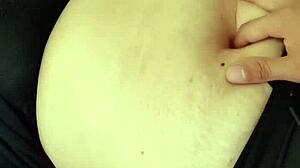 Amateur milf explores orgasmic belly fetish.