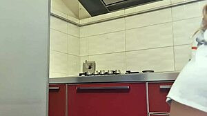 Hot girl cleans stove, shows tits and ass, masturbates intensely