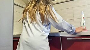 Hot girl cleans stove, shows tits and ass, masturbates intensely