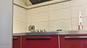 Hot girl cleans stove, shows tits and ass, masturbates intensely