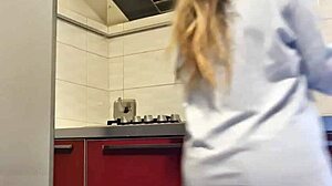 Hot girl cleans stove, shows tits and ass, masturbates intensely
