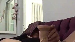 mature woman subtly enjoys intimate self-pleasure in private moments.