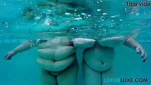 Busty BBW Lexxxi Luxe splashes with friend underwater