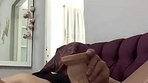 mature woman subtly enjoys intimate self-pleasure in private moments.