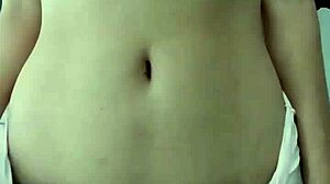 Model poses in sexy pink pajamas with innocent colleague