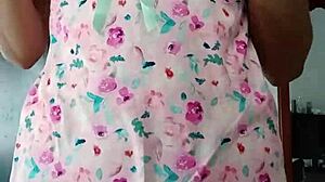 Model poses in sexy pink pajamas with innocent colleague