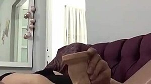 mature woman subtly enjoys intimate self-pleasure in private moments.